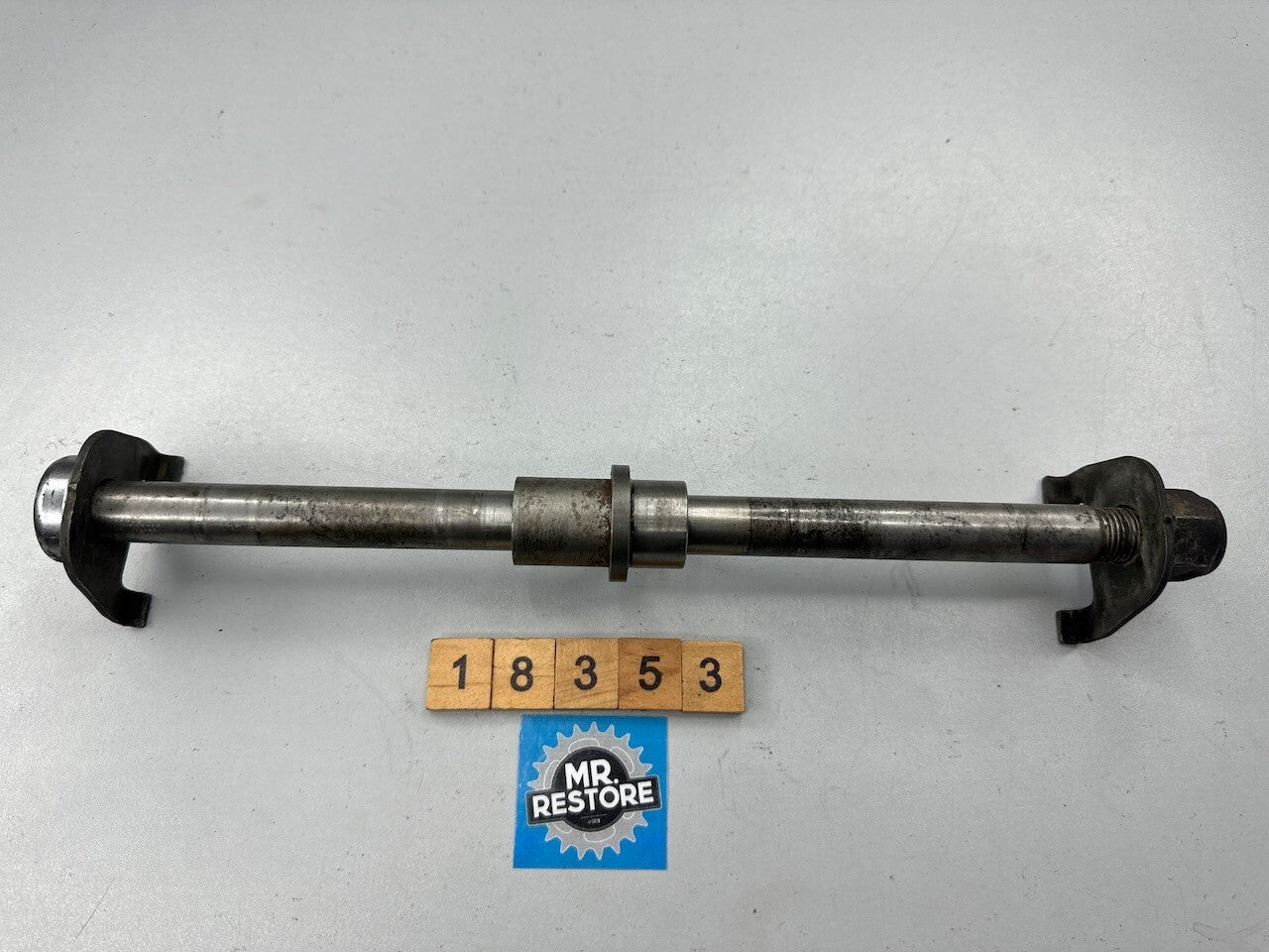 Suzuki GR650 1983-84 Rear Wheel Axle, Spacer, Chain Guides & Nut 64711-15501