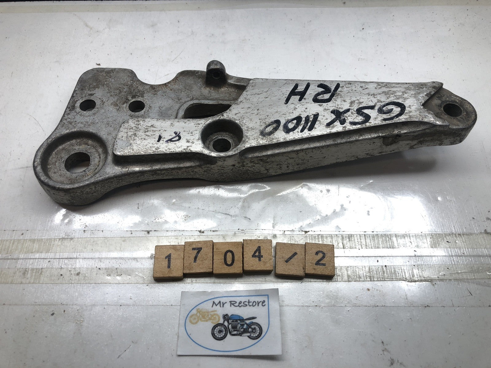 SUZUKI GSX1100 1980-81 R/H footrest bracket 43811-49200