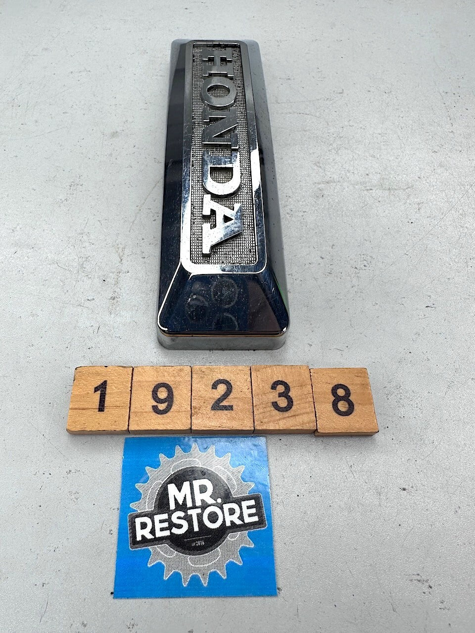 Honda CM250 CM125 CB125 Front Fork Cover Emblem 61401-KB4 (Plastic)