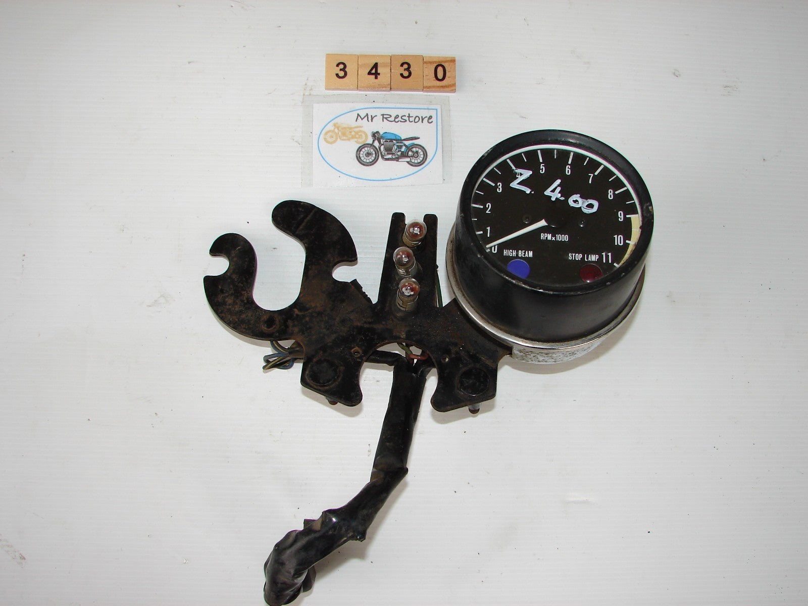 Kawasaki Z400 tachometer with centre console, brackets and loom