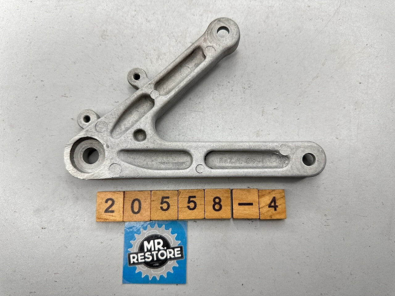 Honda CBR250RR MC22 L/H Footrest Foot Peg Bracket OEM 50700-KAZ