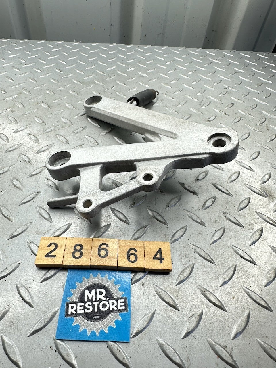 Honda CBR250RR MC22 R/H Footrest Foot Peg Bracket 50600-KAZ