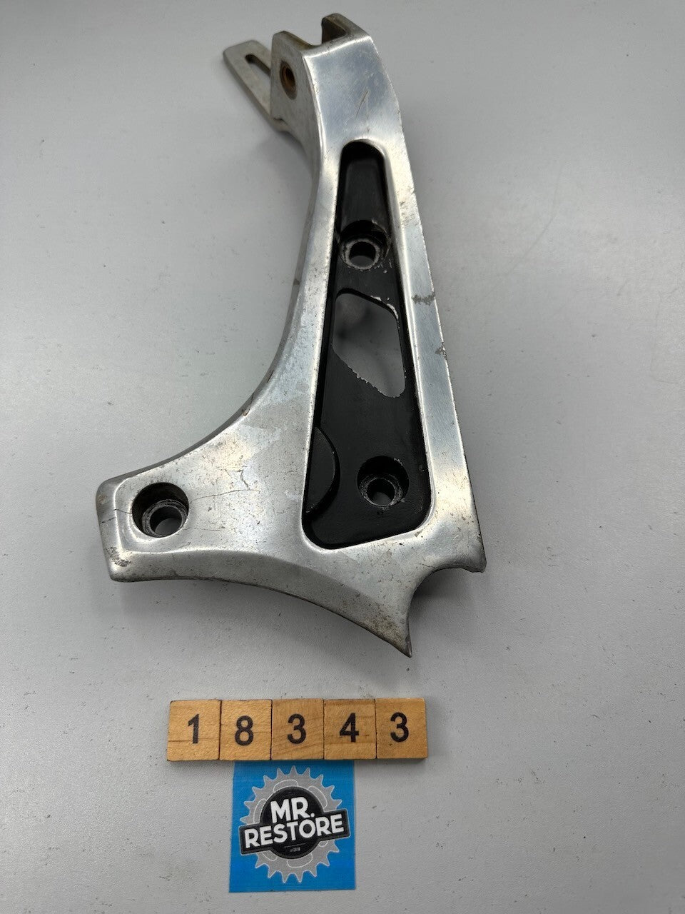 Suzuki GR650 1983-84 L/H Pillion Foot Rest Muffler Bracket 43821-15500