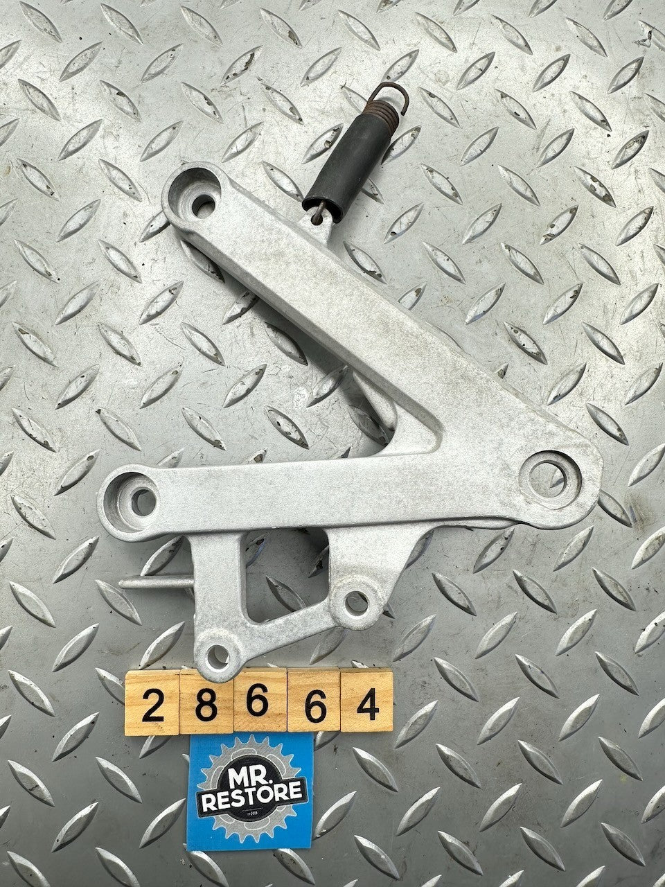 Honda CBR250RR MC22 R/H Footrest Foot Peg Bracket 50600-KAZ
