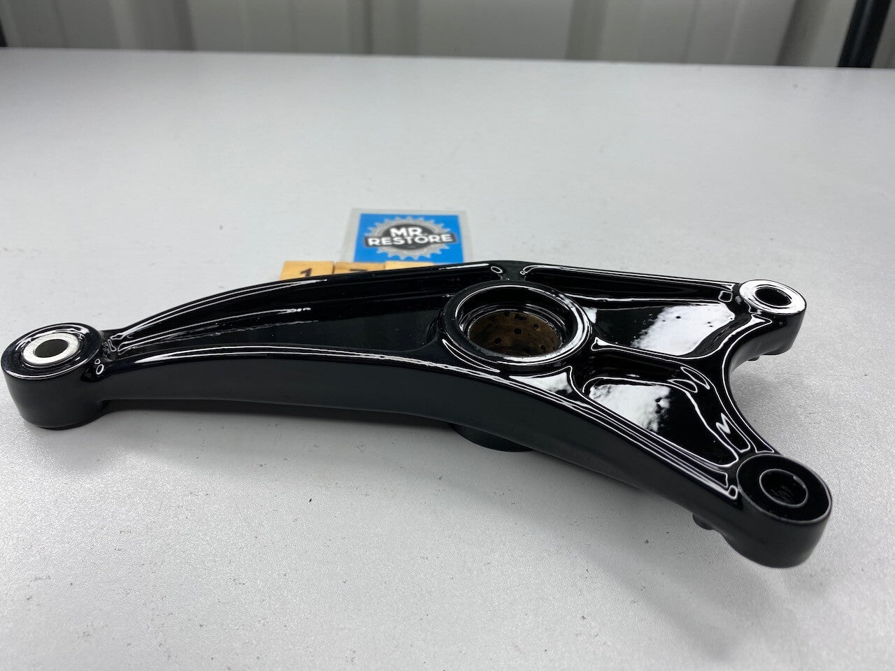 Suzuki RG500 RG400 Rear Brake Caliper Bracket 69720-20A01 - Repainted