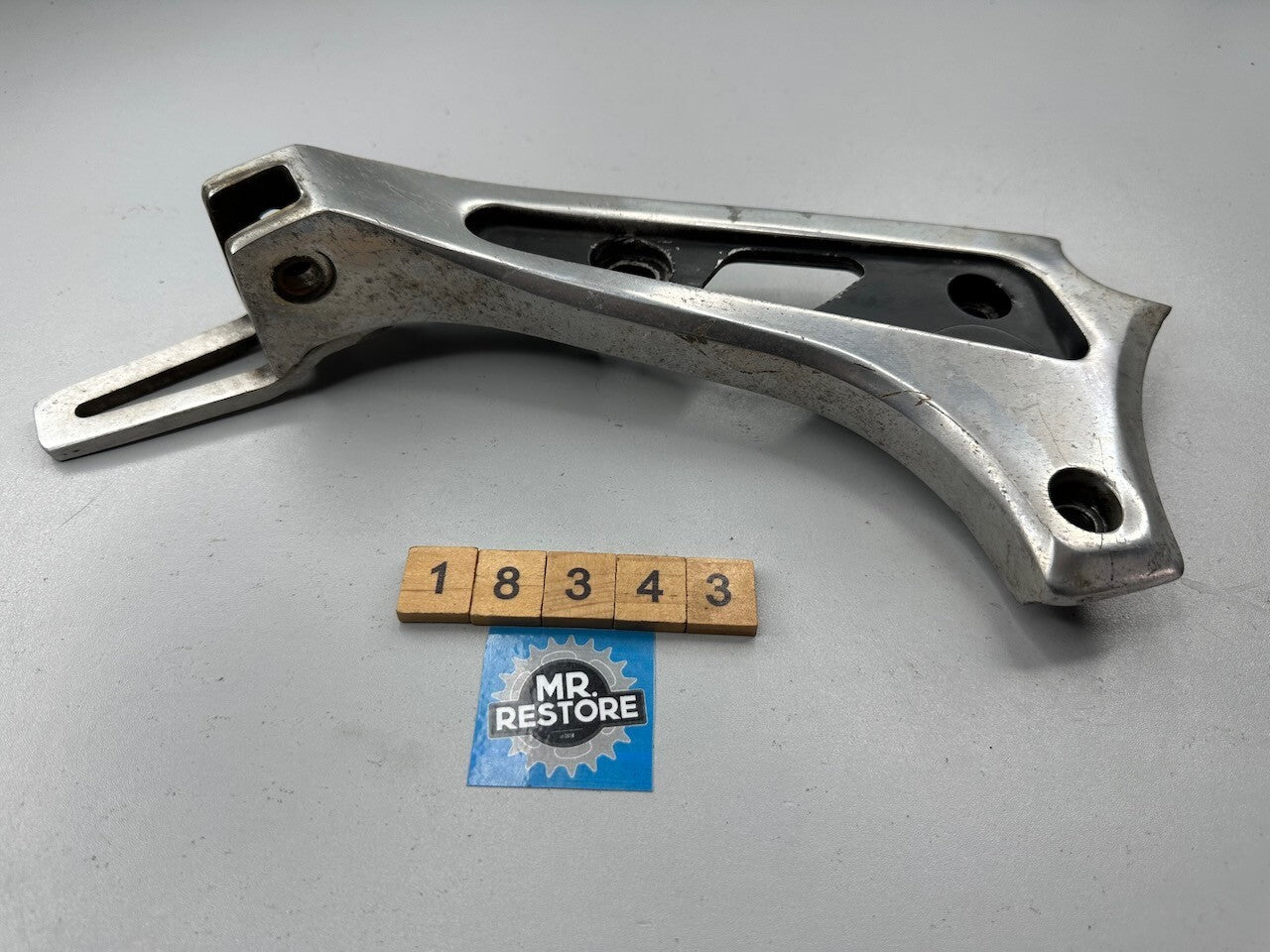 Suzuki GR650 1983-84 L/H Pillion Foot Rest Muffler Bracket 43821-15500