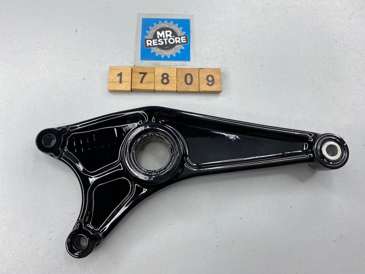Suzuki RG500 RG400 Rear Brake Caliper Bracket 69720-20A01 - Repainted