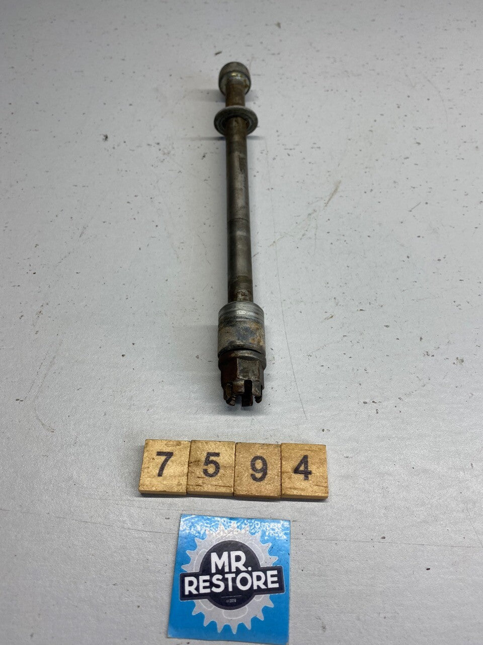 Honda XL100 1973 Front Wheel Axel Spindle & Spacer etc.