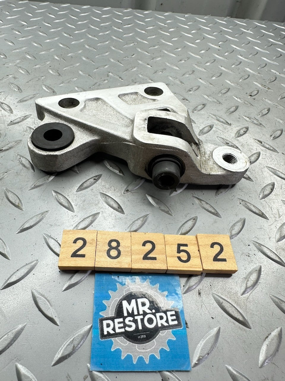 Suzuki RG500 RG400 OEM L/H Footrest Footpeg Bracket 43821-20A00